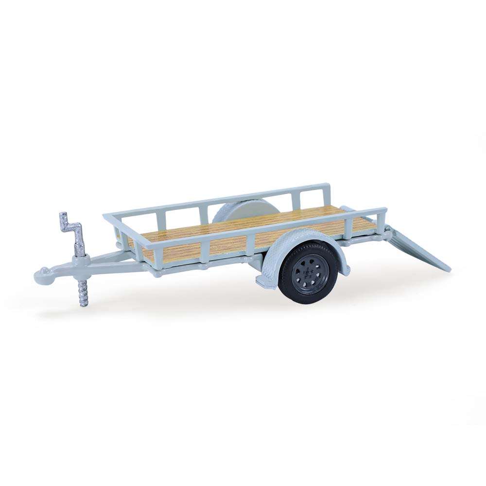 Bronco 4-Door Badlands in Cactus Grey with Utility Trailer and Motorcycle